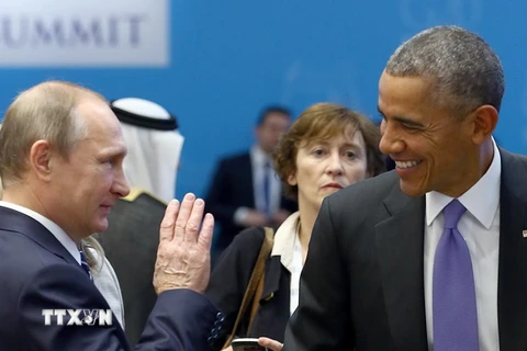 Tổng thống ​Nga Vladimir Putin và người đồng cấp Mỹ Barack Obama. (Nguồn: AFP/TTXVN)