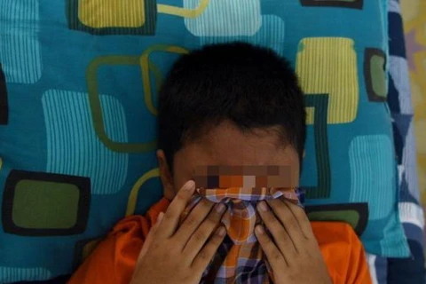 Cậu bé 10 tuổi tội nghiệp bị cắt bộ phận sinh dục khi phẫu thuật cắt bao qui đầu. (Nguồn: Thestar.com.my)