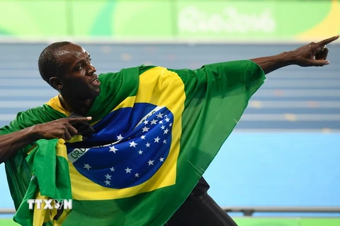 Usain Bolt hoàn tất “hat-trick” Huy chương vàng. (Nguồn: AFP/TTXVN)