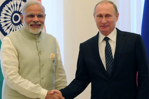 Tổng thống Nga Vladimir Putin và Thủ tướng Narendra Modi (trái). (Nguồn: RT.com)