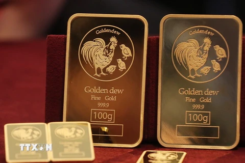 Vàng miếng được bày tại cửa hàng Lotte ở Seoul, Hàn Quốc. (Nguồn: YONHAP/TTXVN) 