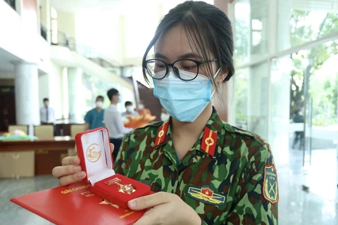 Nữ chiến sỹ Vũ Kim Khánh trong ngày Thành phố Hồ Chí Minh tổ chức lễ tri ân lực lượng hỗ trợ. (Ảnh: TTXVN)