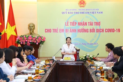 Thứ trưởng Bộ Lao động - Thương binh và Xã hội Nguyễn Thị Hà phát biểu. (Ảnh: Hoàng Hiếu /TTXVN)