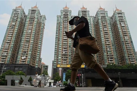 Các tòa nhà do tập đoàn bất động sản Evergrande xây dựng tại Quảng Châu, Trung Quốc. (Ảnh: AFP/TTXVN) 
