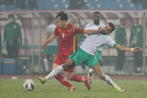 Trận đấu giữa đội tuyển Việt Nam (áo đỏ) và đội tuyển Saudi Arabia tại vòng loại thứ 3 World Cup 2022 khu vực châu Á, tối 16/11/2021. (Ảnh: Minh Quyết/TTXVN)