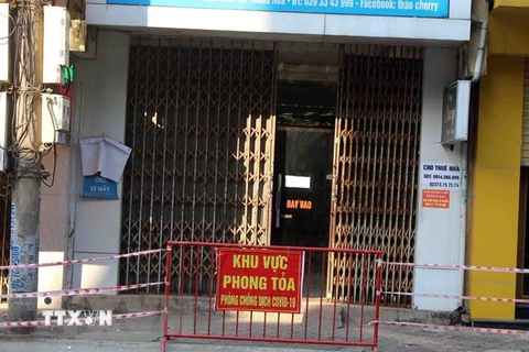 Nhà của một hộ dân sống tại đường Tống Duy Tân, phường Lam Sơn, thành phố Thanh Hóa bị phỏng tỏa để phòng dịch COVID-19. (Ảnh: Nguyễn Nam/TTXVN) 
