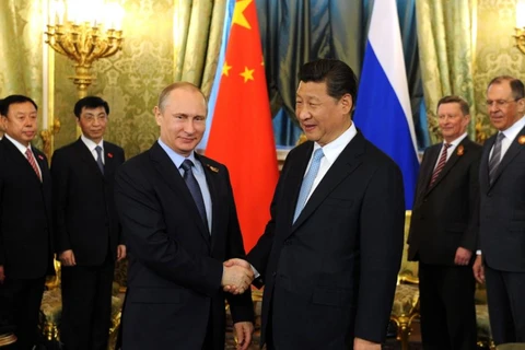 Tổng thống Nga Vladimir Putin và Chủ tịch Trung Quốc Tập Cận Bình. (Nguồn: TASS) 