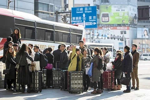 Khách du lịch tập trung đông đúc tại các sân bay, ga tàu trên khắp Nhật Bản.(Nguồn: AFP)