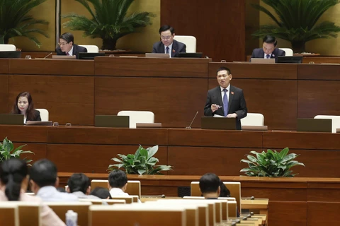 Bộ trưởng Bộ Tài chính Hồ Đức Phớc phát biểu giải trình, làm rõ một số vấn đề đại biểu Quốc hội nêu. (Ảnh: Doãn Tấn/TTXVN)