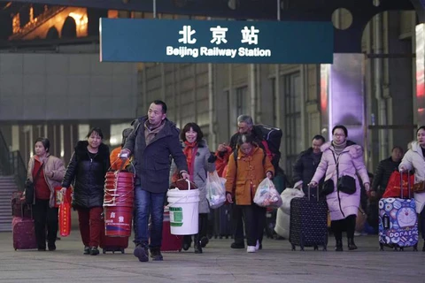 Người lao động tại thành thị đang đổ dồn về các nhà ga xe lửa trên khắp các thành phố lớn nhất của Trung Quốc.(Nguồn: AFP)