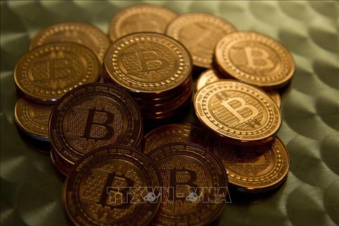Đồng tiền điện tử bitcoin . (Ảnh: AFP/TTXVN) 