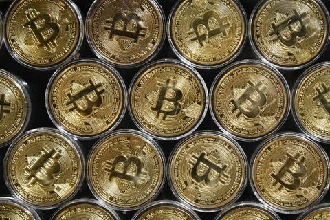 Đồng tiền kỹ thuật số Bitcoin. (Ảnh: AFP/TTXVN) 