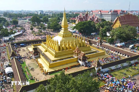 Lễ rước Phasatpheung tại chùa Thatluang ở thủ đô Vientiane, ngày 14/11/2024. (Ảnh: Đỗ Bá Thành/TTXVN) 