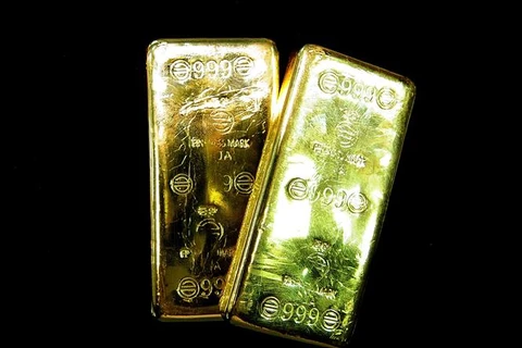 Vàng miếng được bày bán tại một tiệm kim hoàn ở Seoul (Hàn Quốc). (Ảnh: AFP/ TTXVN)