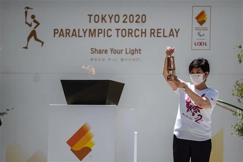Thị trưởng thủ đô Tokyo của Nhật Bản, bà Yuriko Koike tại lễ thắp ngọn đuốc thiêng Paralympic Tokyo 2020 ở Toà thị chính thành phố, ngày 20/8/2021. (Ảnh: AFP/TTXVN)