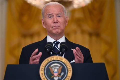 Tổng thống Joe Biden phát biểu tại Nhà Trắng ở Washington, D.C. (Mỹ). (Ảnh: AFP/TTXVN)