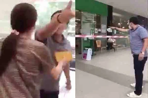 Người đàn ông lớn tiếng, tháo khẩu trang thách thức bảo vệ siêu thị. (Nguồn: vietnamnet.vn)