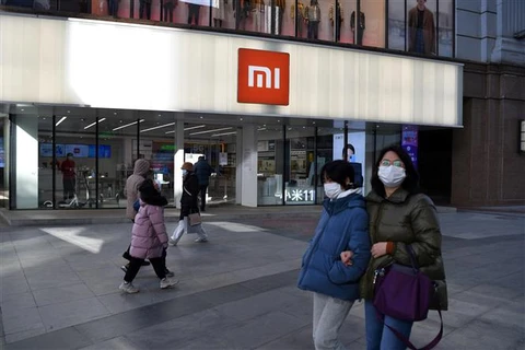 Một cửa hàng của hãng công nghệ Xiaomi ở Bắc Kinh (Trung Quốc), ngày 15/1/2021. (Ảnh: AFP/TTXVN)