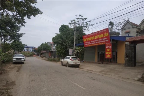 Một trung tâm môi giới bất động sản ở Sóc Sơn. (Ảnh: Mạnh Khánh/TTXVN)