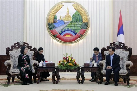 Thủ tướng Lào Phankham Viphavanh tiếp Trưởng Ban Tổ chức Trung ương Trương Thị Mai. Ảnh: Phạm Kiên - Phóng viên TTXVN tại Lào