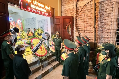 Lễ viếng Trung tá Bùi Văn Nhiên tại gia đình. (Nguồn: qdnd.vn)