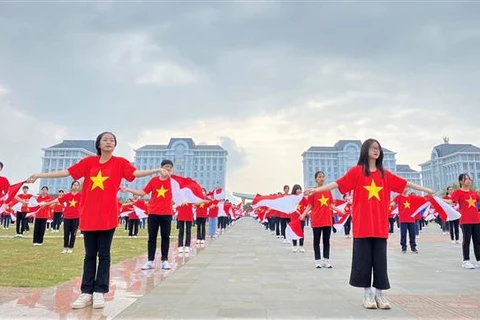 Học sinh đồng diễn "Khát vọng tuổi trẻ Lai Châu" trong Ngày hội thanh, thiếu nhi các dân tộc tỉnh Lai Châu, cuối tháng 10/2022. (Ảnh: Nguyễn Oanh/TTXVN)