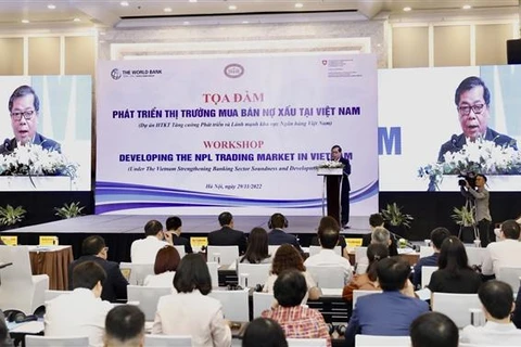 Quang cảnh tọa đàm "Phát triển thị trường mua bán nợ xấu tại Việt Nam" tại Hà Nội ngày 29/11/2022. (Ảnh: Trần Việt/TTXVN)