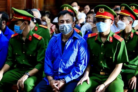 Bị cáo Nguyễn Minh Khải tại phiên xét xử ngày 30/11/2022. (Ảnh: Thành Chung/TTXVN)