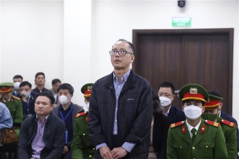 Bị cáo Đỗ Quốc Hùng (cựu Giám đốc BIDV chi nhánh Thành Đô) tại tòa. (Ảnh: Kim Anh/TTXVN)