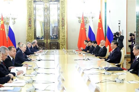 Tổng thống Nga Vladimir Putin và Chủ tịch Trung Quốc Tập Cận Bình tại cuộc hội đàm ở Moskva, ngày 21/3/2023. (Ảnh: THX/TTXVN)