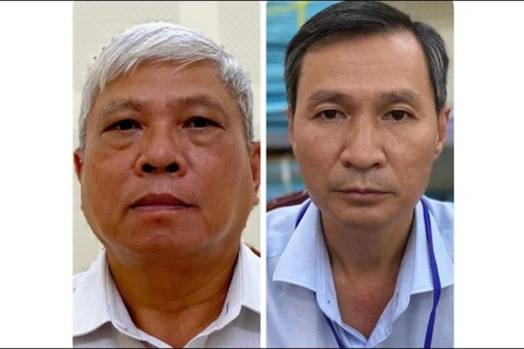 Hai bị can Đặng Quang Việt (trái) và Nguyễn Thành Nhân. (Nguồn: VOV)