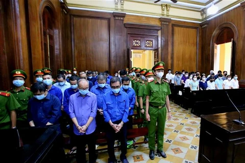 Các bị cáo tại phiên tòa tuyên án. (Ảnh: Thành Chung/TTXVN)