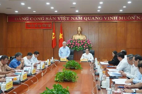 Chủ tịch Ủy ban Trung ương Mặt trận Tổ quốc Việt Nam Đỗ Văn Chiến cùng Đoàn Công tác làm việc tại tỉnh Bà Rịa-Vũng Tàu. (Ảnh: Huỳnh Sơn/TTXVN)