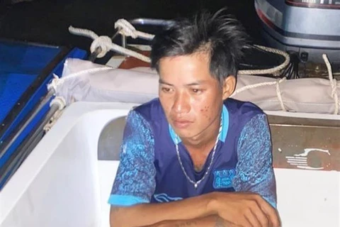 Sau khi gây án ngày 18/9, vào tối cùng ngày, đối tượng Nguyễn Văn Đương đến Cơ quan Công an đầu thú. (Ảnh: TTXVN phát)