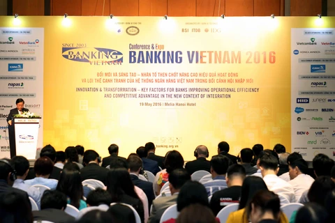 Triển lãm Banking Vietnam 2016 diễn ra sáng 19/5, tại Hà Nội. (Ảnh: Doãn Đức/Vietnam+)
