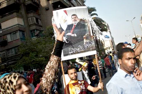 Người biểu tình ủng hộ ông Morsi ở Cairo hôm 8/11. (Nguồn: AFP)