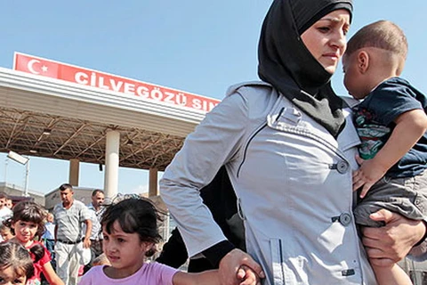 Hơn 1,5 triệu người Syria đã rời đất nước trong năm 2013