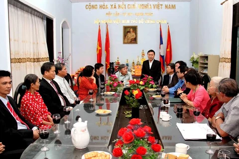 Việt kiều Lào gắn kết quan tâm giúp đỡ người nghèo 