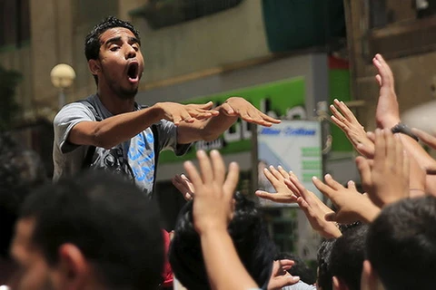 Người biểu tình ủng hộ cựu tổng thống Morsi trong cuộc tuần hành ở trung tâm Cairo, ngày 19/6. (Nguồn: Reuters)