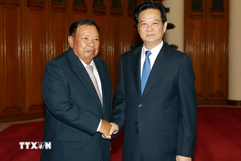 Thủ tướng Nguyễn Tấn Dũng tiếp Thường trực Ban Bí thư, Phó Chủ tịch nước Lào Bounnhang Vorachith. (Ảnh: Đức Tám/TTXVN)