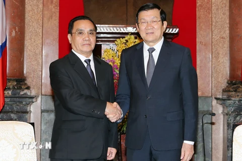 Chủ tịch nước Trương Tấn Sang tiếp Thủ tướng Lào Thongsing Thammavong đang thăm và làm việc tại Việt Nam. (Ảnh: Nguyễn Khang/TTXVN)