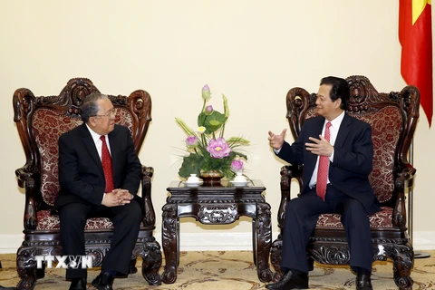 Thủ tướng Nguyễn Tấn Dũng tiếp ông Kyaw Kyaw Maung, Thống đốc Ngân hàng Trung ương Myanmar. (Ảnh: Đức Tám/TTXVN)