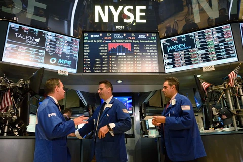 Các nhà đầu tư tại sàn giao dịch New York. (Nguồn: AFP)