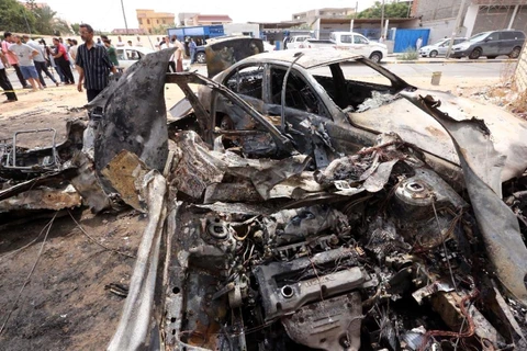 Hiện trường một vụ đánh bom xe ở Libya, hồi tháng 9. (Nguồn: AFP)