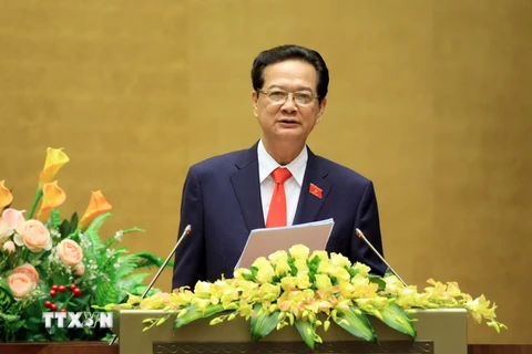 Thủ tướng Nguyễn Tấn Dũng trình bày báo cáo trước Quốc hội. (Ảnh: Doãn Tấn/TTXVN)