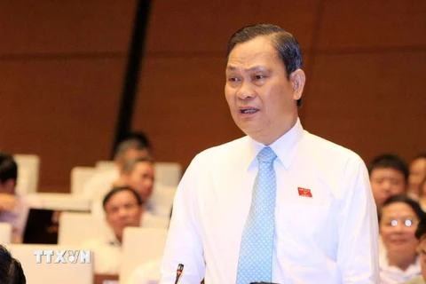 Bộ trưởng Bộ Nội vụ Nguyễn Thái Bình trả lời câu hỏi chất vấn của đại biểu Quốc hội. (Ảnh: Doãn Tấn/TTXVN)