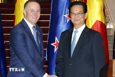 Thủ tướng Nguyễn Tấn Dũng đón, tiếp Thủ tướng New Zealand John Key. (Ảnh: Đức Tám/TTXVN)