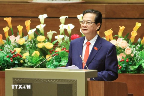 Thủ tướng Nguyễn Tấn Dũng trình bày báo cáo trước Quốc hội. (Ảnh: Doãn Tấn/TTXVN) 