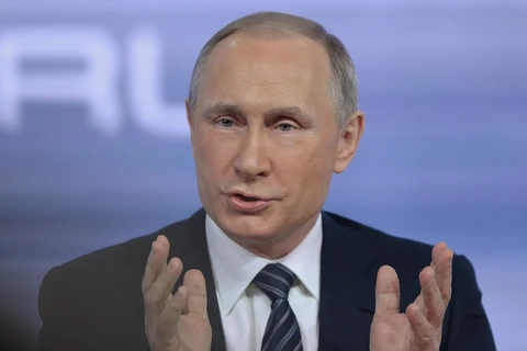 Tổng thống Nga Vladimir Putin trả lời phỏng vấn báo chí tại cuộc họp báo. (Nguồn: AFP)