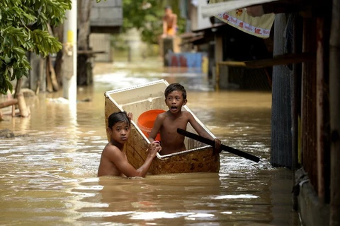 Tình trạng ngập lụt ở Candaba, Pampanga, phía Bắc Manila ngày 18/12. (Nguồn: AFP)